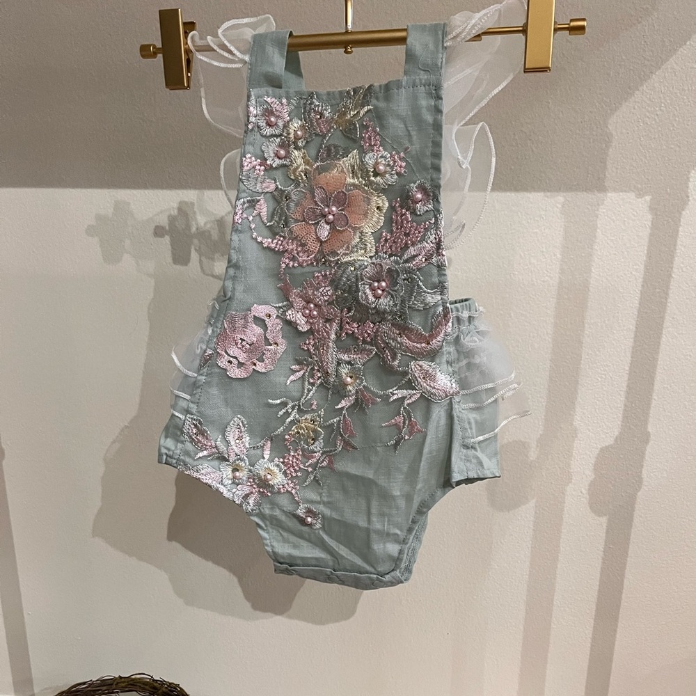 Precious detailed romper, limited quantity.
